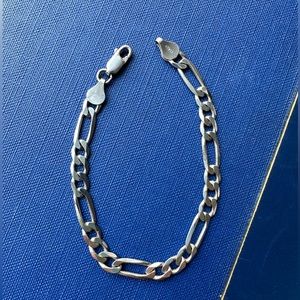 SOLD Vintage sterling silver figaro chain bracelet